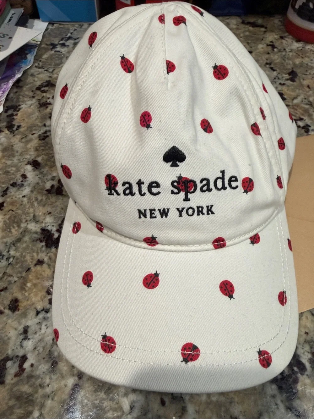 kate spade Cream Baseball Cap with Red Ladybug Print